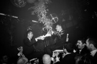 Two grooms dancing the Hora, a traditional Jewish wedding dance, during their wedding in San Sebastián