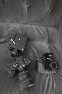 Detail photo of wedding camera and vintage film camera