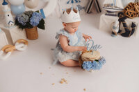 Baby celebrates her 1st birthday with a Cake Smash Photoshoot at Holy City Babies Portrait Studio in Charleston, SC.