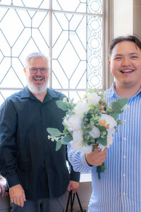 wedding guests celebrating at san francisco city hall wedding