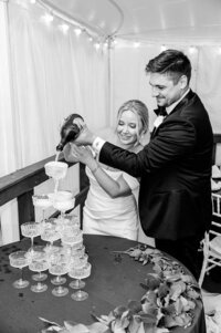 glass champagne pyramind pour at wedding reception