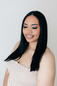 The Houston look features glamorous curls with extra shine, styled at SoCo Blow Dry Bar for upscale nights out