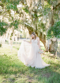 bridal portraits under the glowing oaks in south carolina