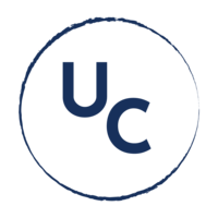 A dark blue circular monogram submark for Upstream Consulting.