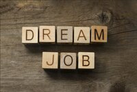 The words "Dream Job" written in wood blocks