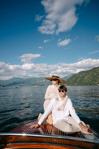stylish-couple-wooden-boat-lake-como