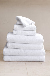 Commercial Lifestyle product photography ecommerce for luxurious organic towels washcloths bedding linen company brooklinen