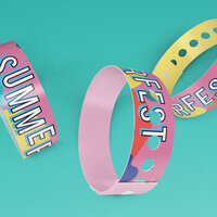 Colorful Summerfest event wristbands with Cross Point branding