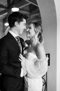 bride and groom looking at each other by wedding photographer georgia