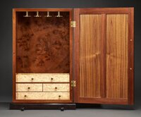 the inside of a shaker style jewelry box in walnut burl