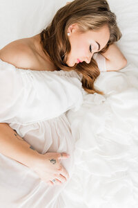 Pregnant woman in maternity portrait photographed by Niceville family photographer