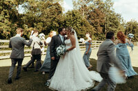 Bride and groom during barn wedding ceremony at Mason Farms in North Georgia, shot by Crimson Conure Photography based in Denver, Colorado and Kennesaw, Georgia