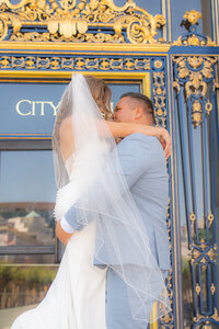 wedding couple exit san francisco city hall wedding
