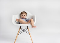 silva-slouching-in-chair-chicago-portrait-studio