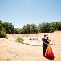 Bride & groom with tents in Sonoma