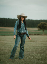 Senior portrait at Triple T Farms in Fruitdale, Alabama — full-body
