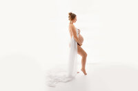 Pregnant Mother poses for Maternity Photos in Charleston.