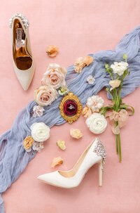 Blush flat lay with badgley mischka heels and white flowers for wedding, photo by Anastasiya Photography - San Francisco Wedding Photographer