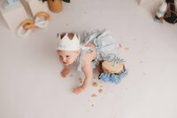 Baby celebrates her 1st birthday with a Cake Smash Photoshoot at Holy City Babies Portrait Studio in Charleston, SC.