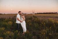 Maternity Photos in Charleston, SC -- Expectant mother poses for Maternity Portraits during Sunset on the Marsh Charleston, SC.
