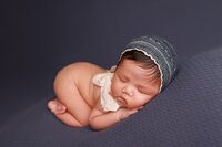 Sacramento newborn photography featuring a simple and clean setup with neutral colors and delicate styling for a timeless look