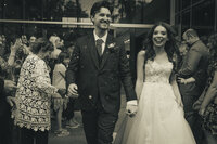 just married couple exiting their ceremony, flower petal exit, vintage inspired wedding, nyc wedding photographer, new york wedding photographer