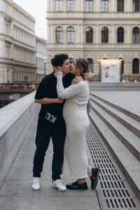 Authentic and joyful couple moment in a Prague cafe - cinematic lifestyle photography