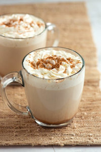 latte with whipped cream and cinnamon