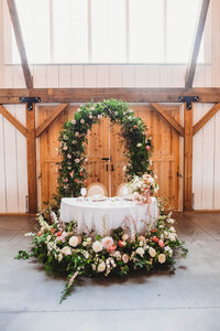 couples sweetheart table wedding photography