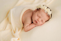 Infant posed for Newborn Photos in Charleston, SC.