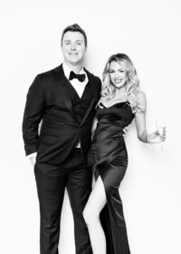 Luxury fine art portrait from Luxe Portraiture LV featuring a couple in formal attire captured in timeless black‑and‑white portrait photography that highlights sophistication and style.