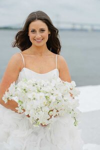 Newport wedding photo of bride with flowers