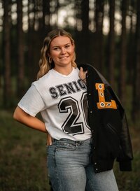 Senior Portrait at Loblolly Farm in Semmes, Alabama -- wearing senior shirt.