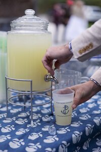 Guests gets a drink with monogrammed cup.