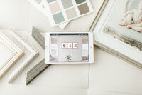 clients ordering frames from miami photographer Ivanna Vidal Photography
