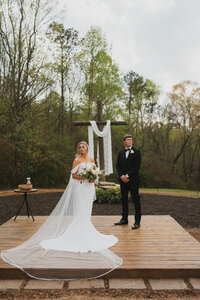 christian wedding photos in front of cross during a destination wedding