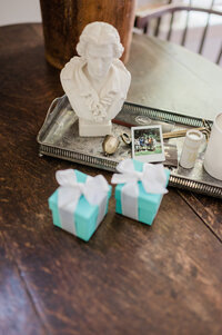 Two wedding bands wrapped in their Tiffany & Co boxes