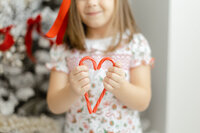 Dondolo branding session in a Dallas photography studio photographing christmas dresses.,
