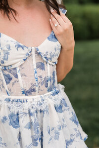 Bridal gown detail with blue floral design in wedding photography Detroit MI