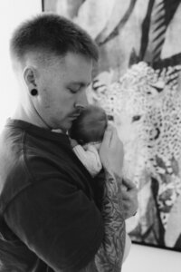 Dad and baby during a newborn session in Christchurch