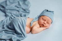 Newborn Pictures in Charleston - Infant posed for Newborn Pictures during Newborn Photoshoot at Holy City Babies Newborn Photography Studio in Charleston, SC.