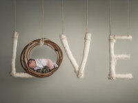 Los Angeles newborn studio photography love card portrait, softly edited and photoshopped for a birth announcement card with true to life color and gentle light.