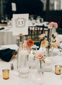 Rustic reception table number with pear and floral details by Flowergirl Cville at Keswick Vineyard, Charlottesville area | Photo by Abby Hart Photography