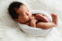 Infant posed for Newborn Photos in Charleston, SC.