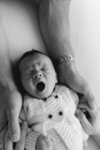 black and white photo during a newborn session with a Christchurch photographer