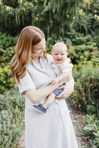 Happy baby and mom enjoying Toronto park during their Toronto Family Photo session