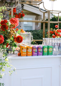 Branded beverage display photographed during a corporate event, highlighting product presentation and styling