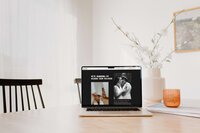 Open laptop on a table showing a homepage design by Eugene web designer Bloem Creations.