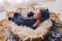 Newborn Pictures in Charleston - Infant posed for Newborn Pictures during Newborn Photoshoot at Holy City Babies Newborn Photography Studio in Charleston, SC.