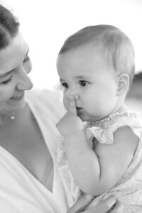 A coastal New England family session with toes in the sand and salty snuggles by the water's edge. North Shore Family Photographer. Deborah Zoe Photography.